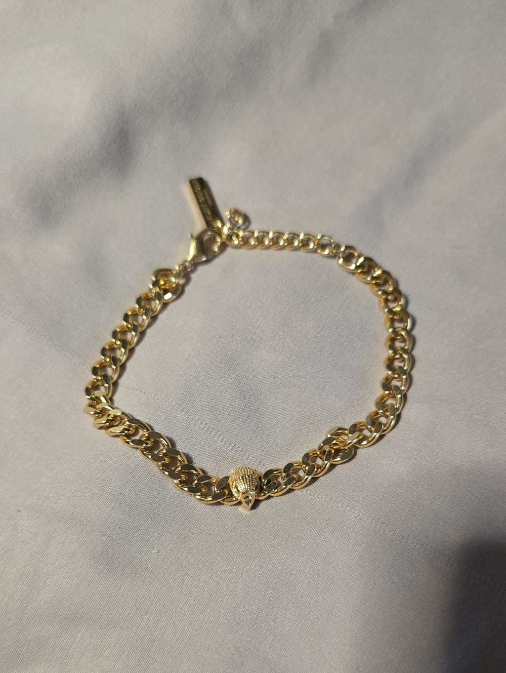 Kurt Geiger Gold-Tone Chain Bracelet with Raven Head.